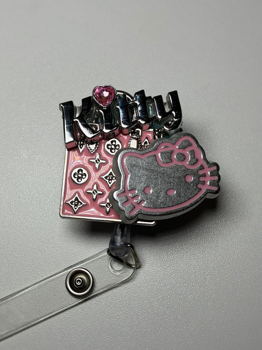 LV KITTY BADGE REEL