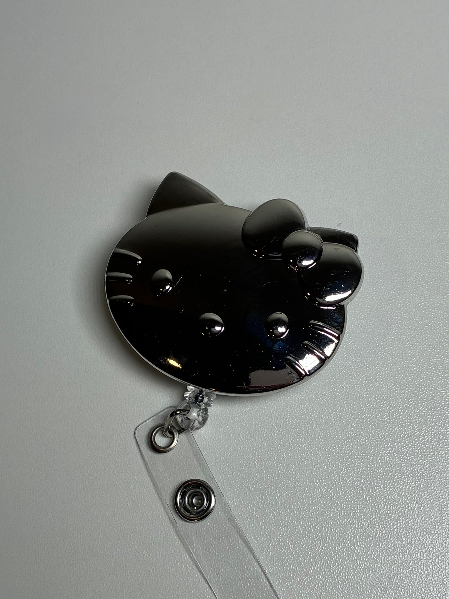 HK BADGE REEL
