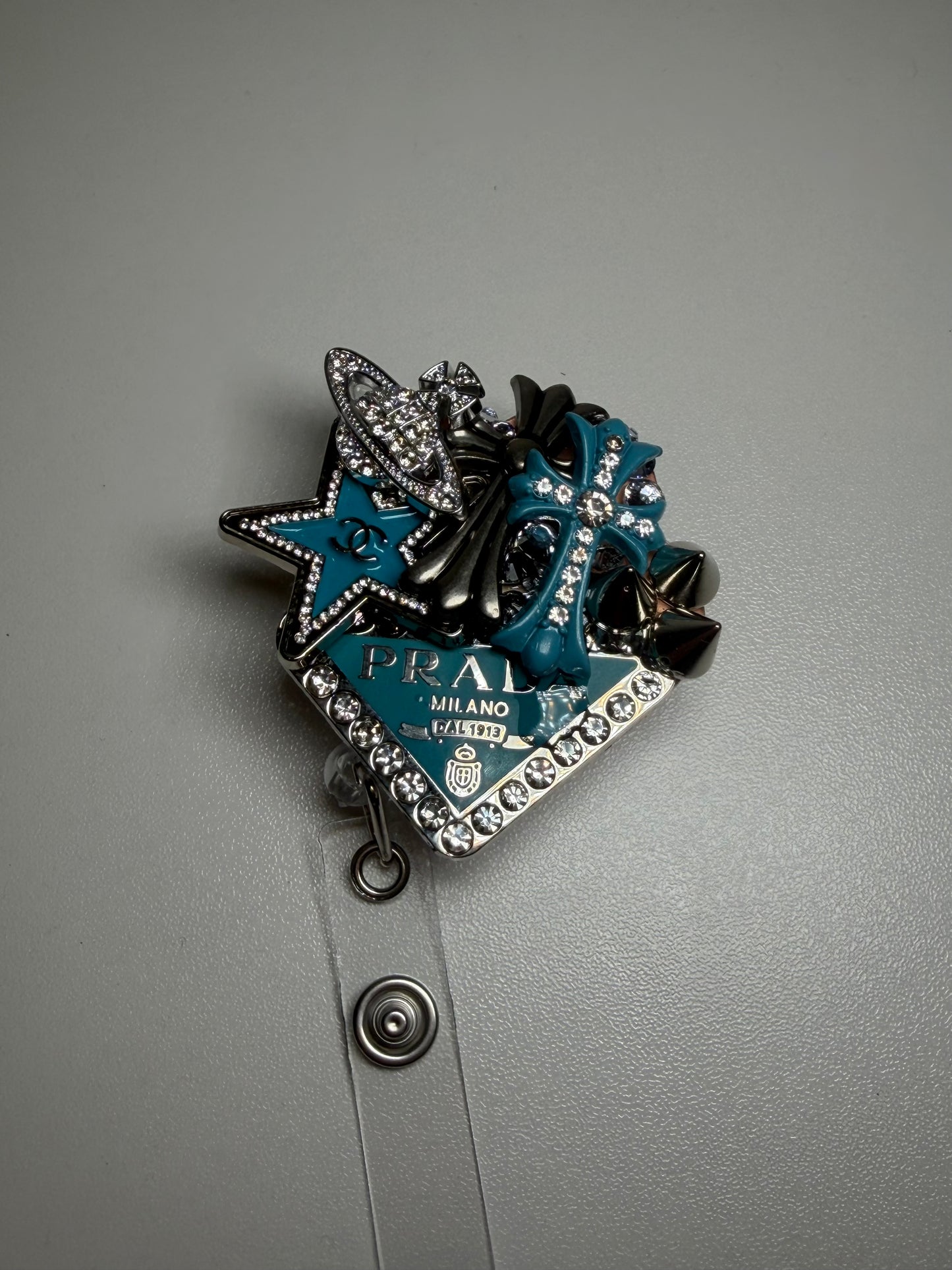 TIFFANY BADGEREEL