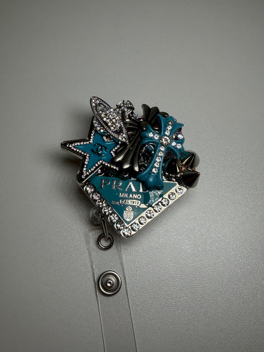 TIFFANY BADGEREEL