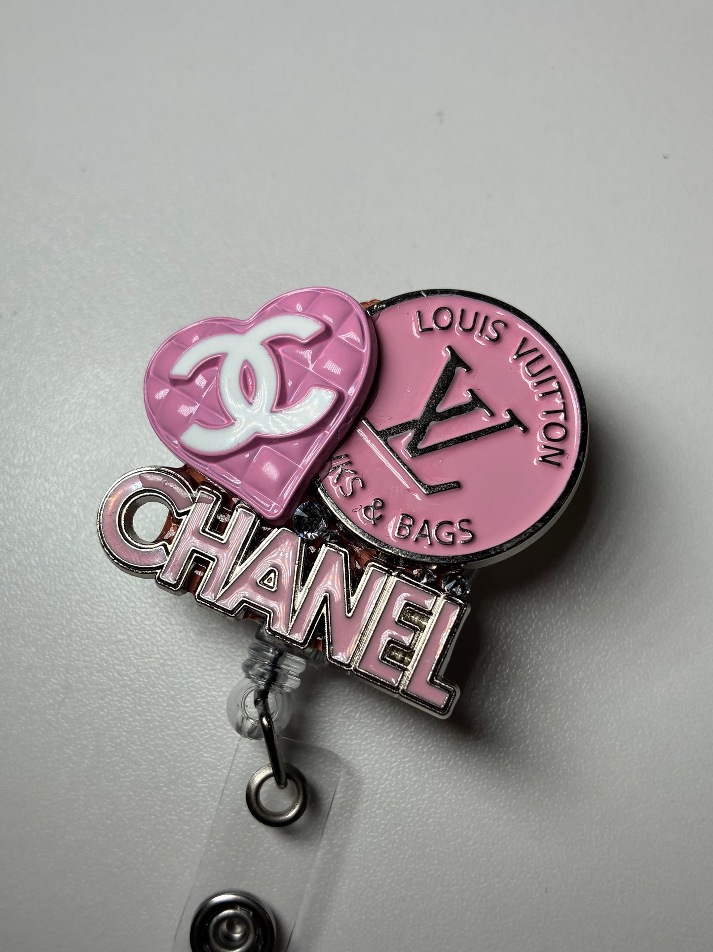 LV BADGE REEL